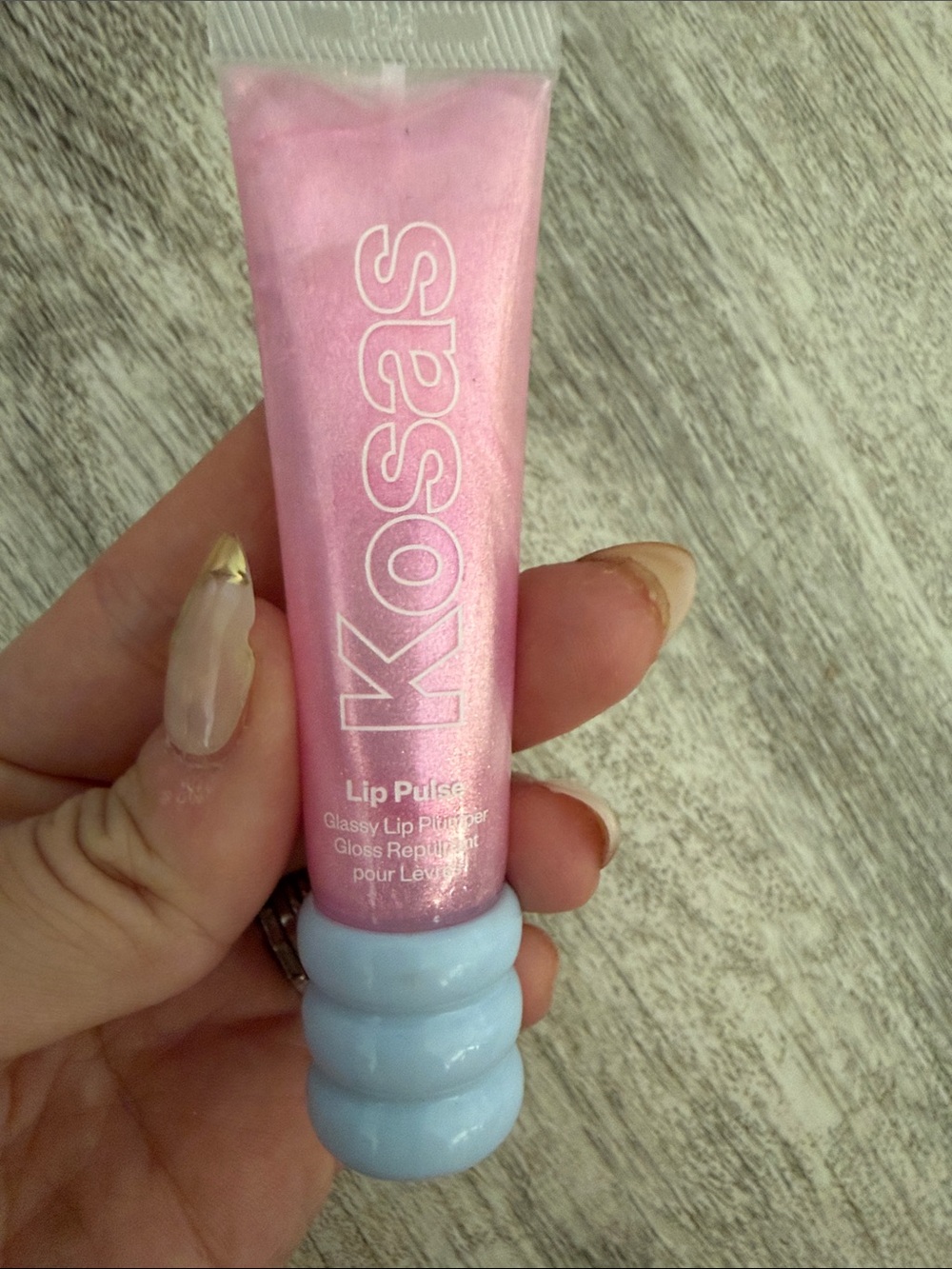 Kosas Lip Pulse Gloss Tube in Shimmery Pink with Light Blue Cap